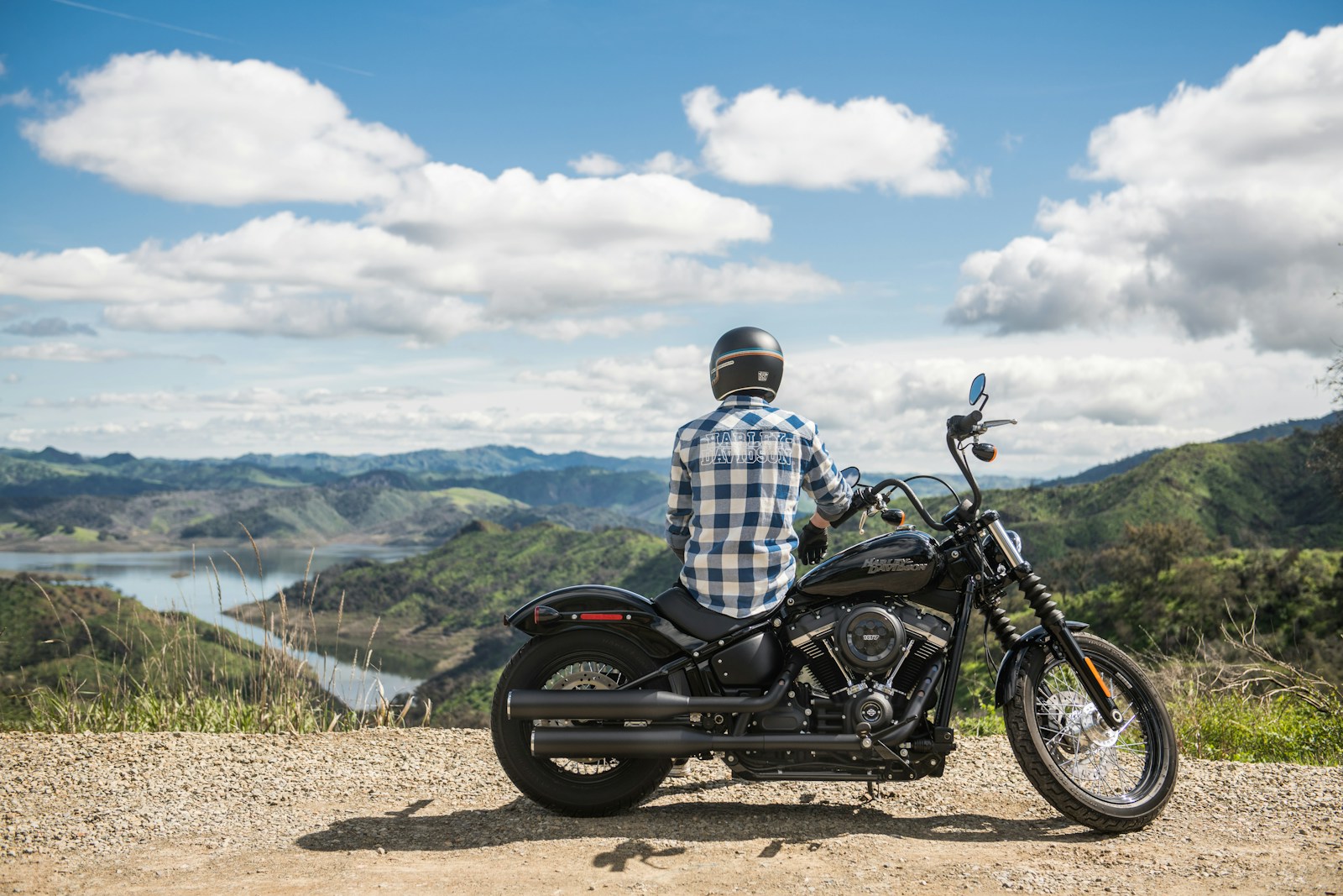 man sitting on the motorcycle with motorcycle insurance